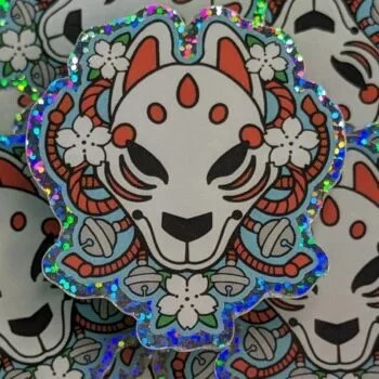 Enchanting Kitsune Mask Sticker: Japanese Fox Folklore Art with Intricate Detailing and Cultural Charm